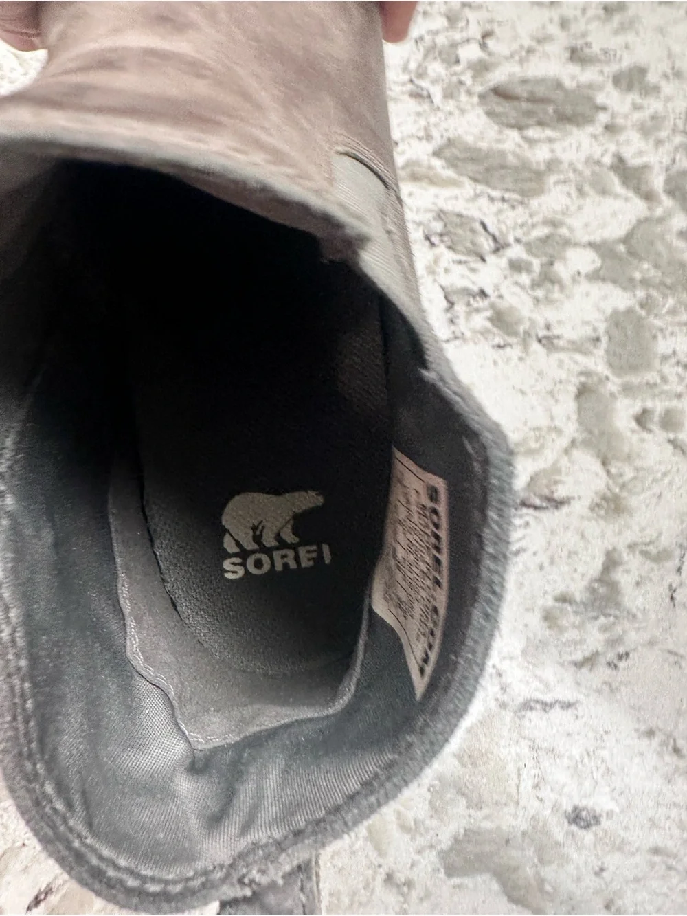 Sorel Evie II Chelsea waterproof boots in a gray leather and suede finish.